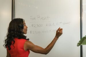 Real estate agent reviewing CEA compliance alongside SEO content in Singapore