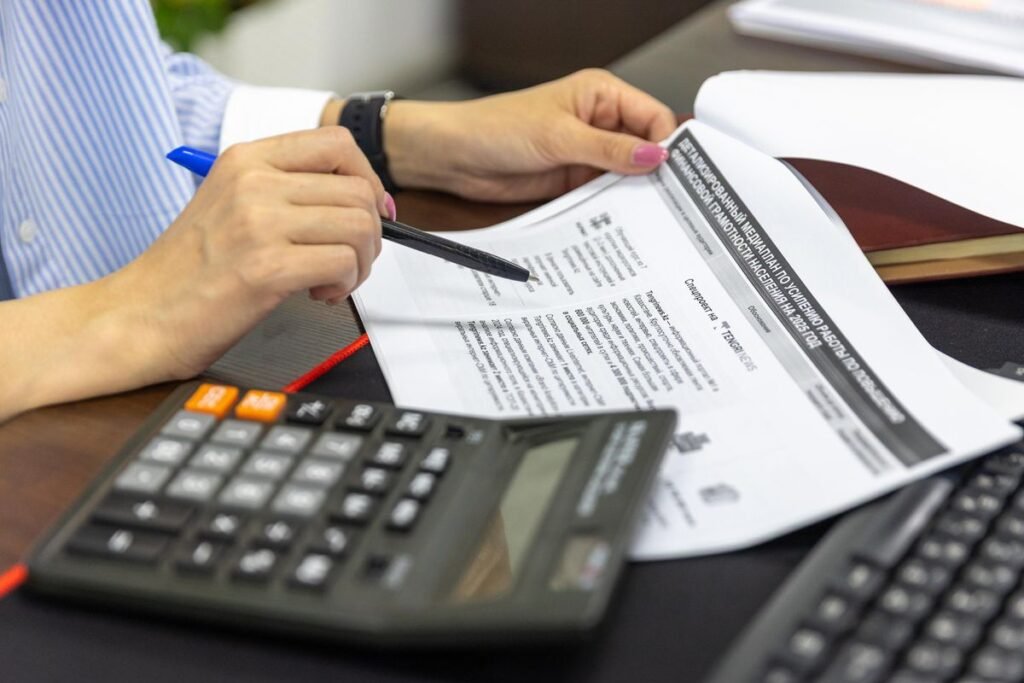 Seo budget and pricing breakdown sheet on a desk for seo cost automotive singapore