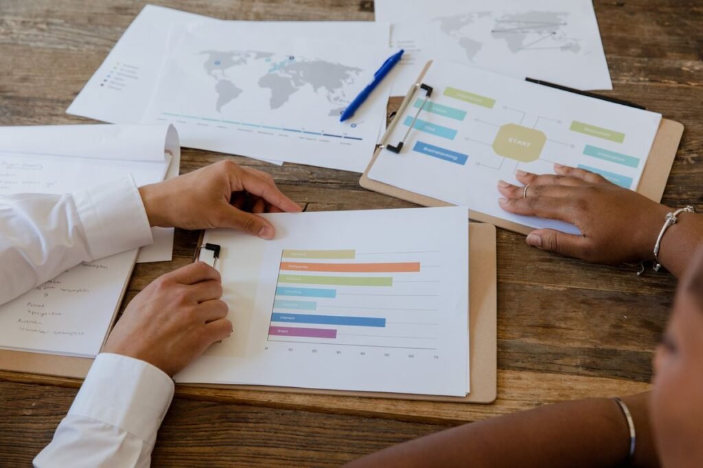 Person reviewing performance graphs representing outrank construction competitors google singapore analysis