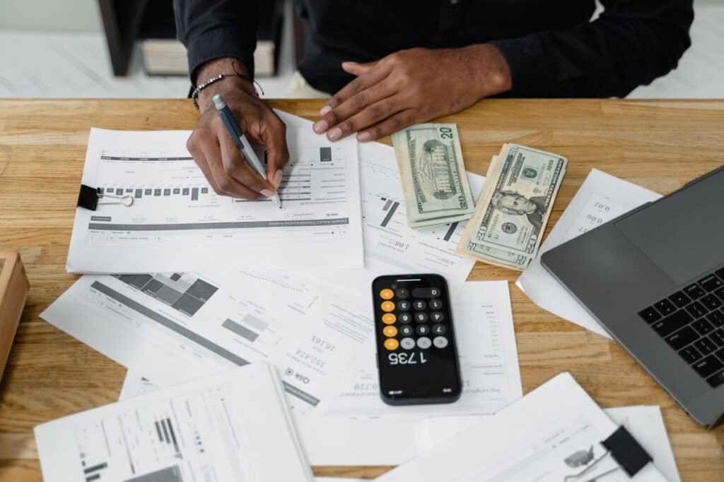 Seo budget and pricing breakdown sheet on a desk for seo cost school singapore