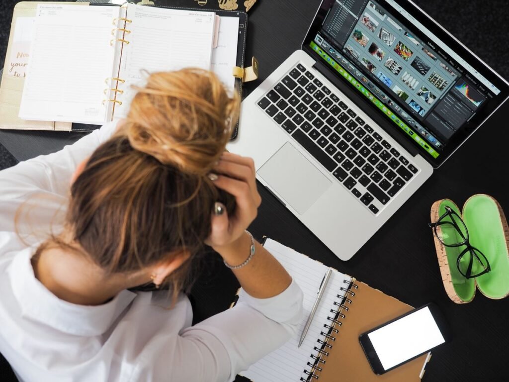 Shop owner reviewing a declining traffic graph illustrating seo mistakes retail singapore businesses commonly make