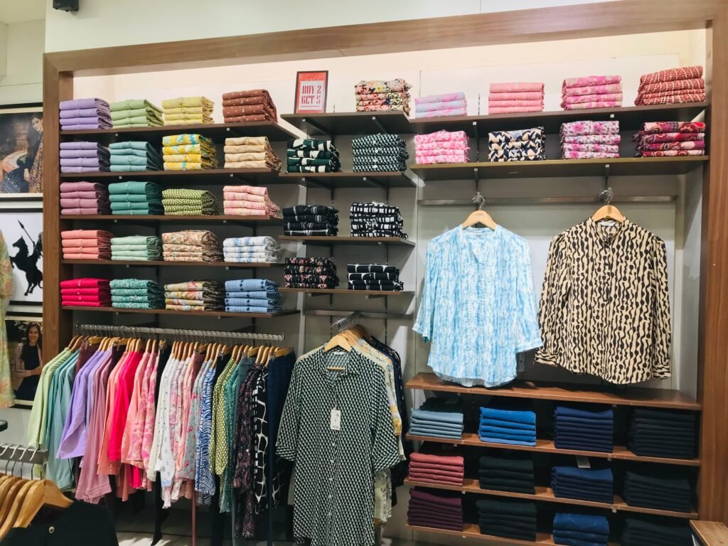 Organized colourful clothing display representing Shopify collection page SEO Singapore structure