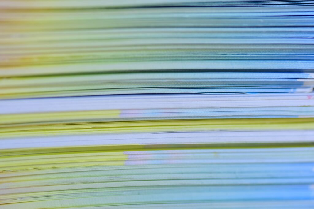 Colourful stack of duplicate papers representing a Shopify duplicate content fix Singapore audit