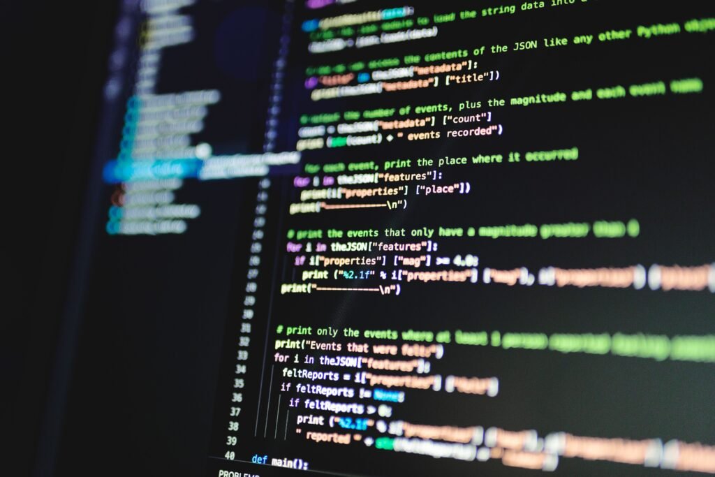 Monitor displaying lines of code representing Shopify schema markup Singapore structured data setup
