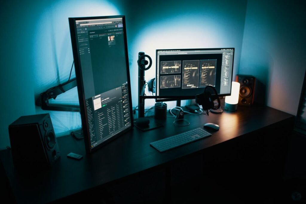 A dual monitor workspace of the kind used to run off page seo tools