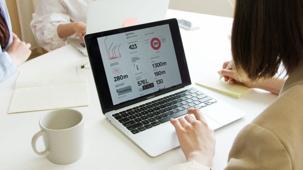 Setup Google Search Console Singapore business owner reviewing the performance report on a laptop