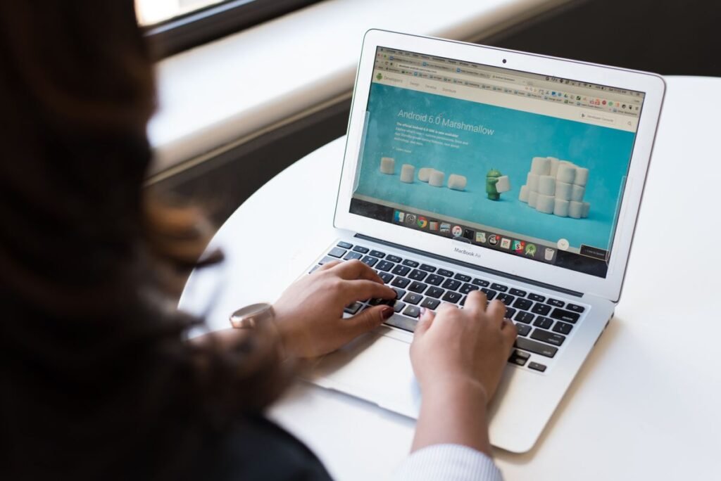 WordPress caching plugins being compared on a laptop by a Singapore site owner