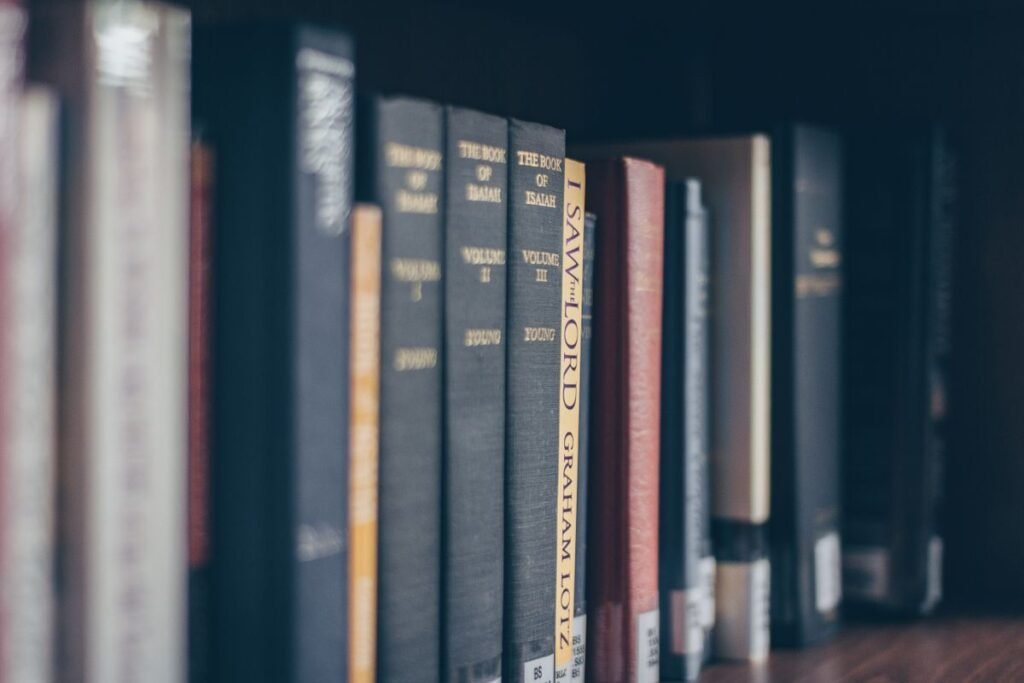Library shelf of reference books illustrating backlinks meaning as citations between sources