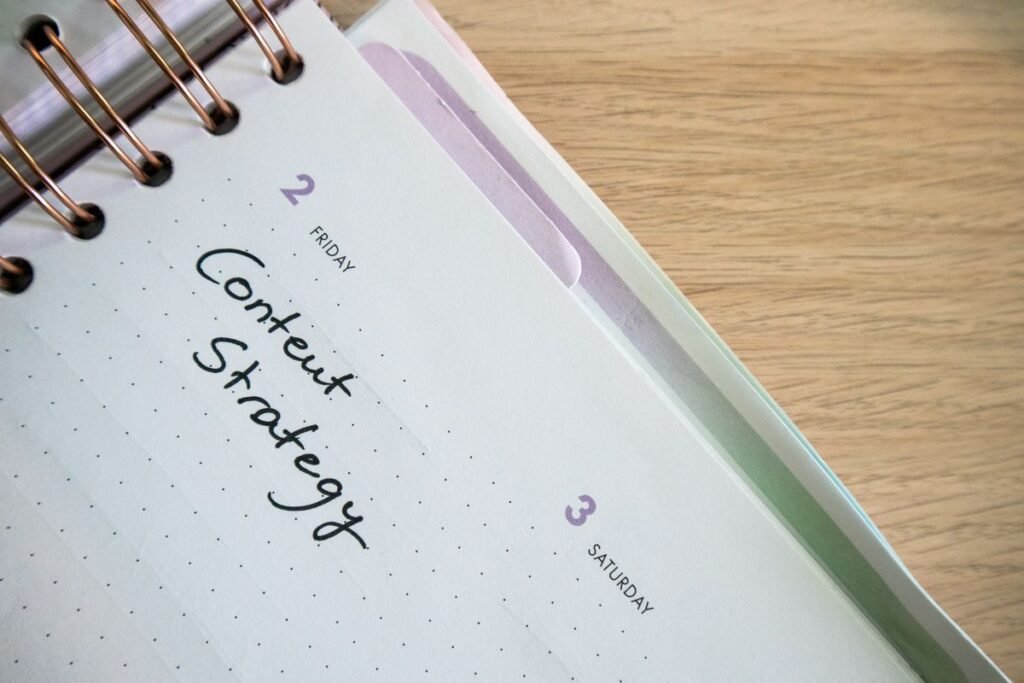 Notebook page titled Content Strategy, the plan a content marketing agency Singapore businesses hire should deliver